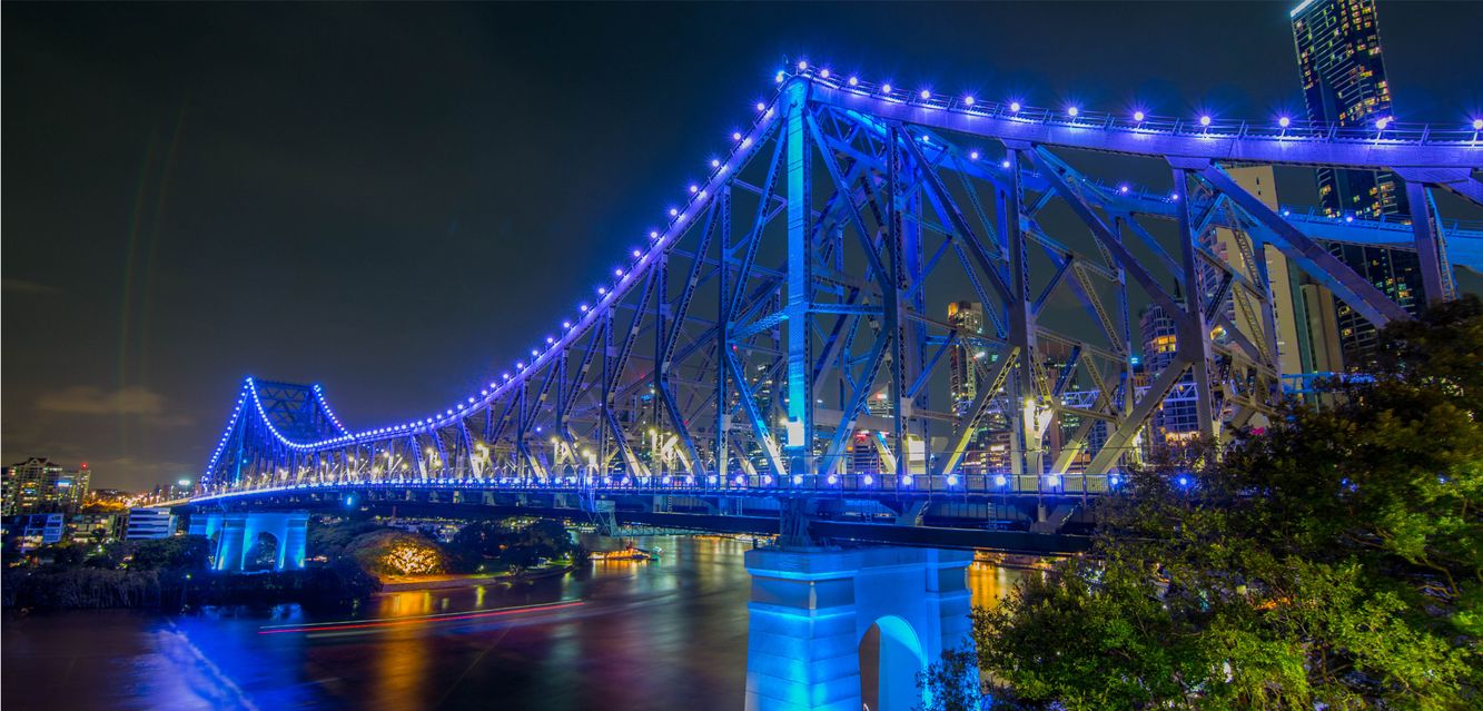 Fortitude Valley’s Story Bridge illuminated at night.