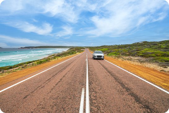 Rental car on the side of a road.